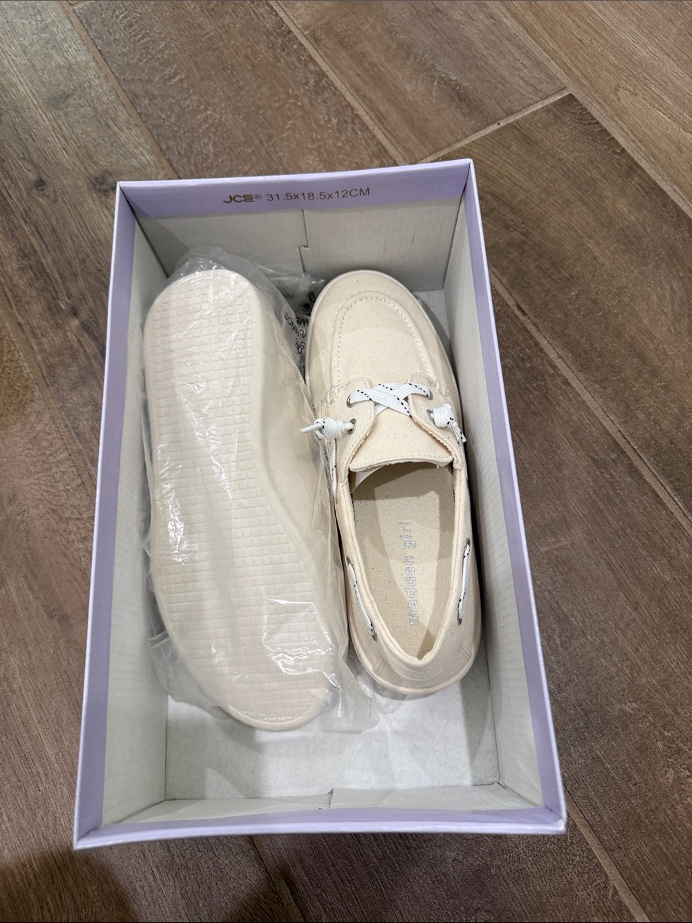 Madden Girl Cream Slip-On Boat Shoes